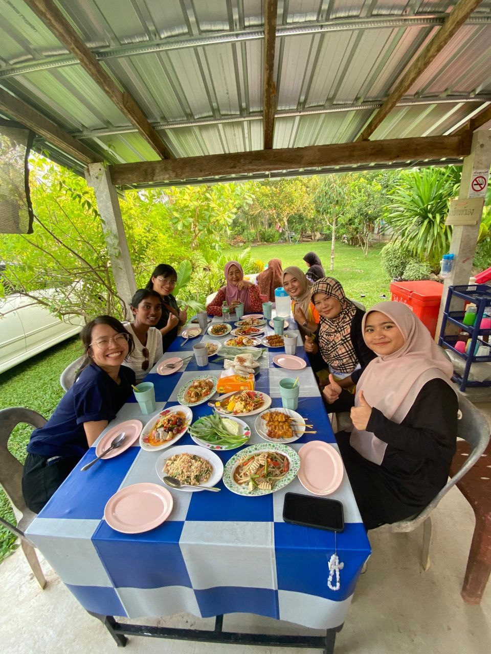 Jocelyn sharing a homestay meal with new friends during an ASEAN youth exchange